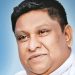 හෙල්මටයකින් ගුටි කෑ බව කියන ‘ඇමති’ කියන කතාව මෙන්න
